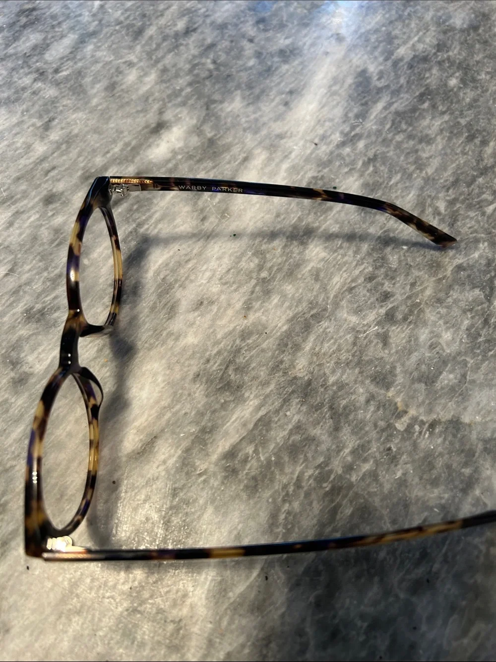 Warby Parker Tortoiseshell Round Glasses - Brown & Black Model is Blakey